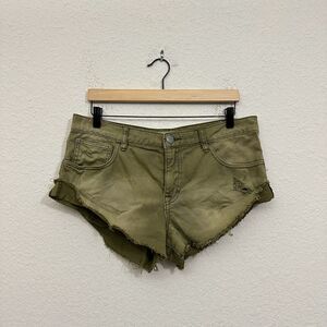 FREE PEOPLE Distressed Hot Pants Denim Shorts in Olive Green